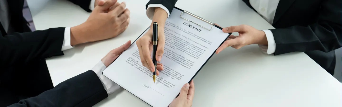 Before You Sign: 5 Key Contract Clauses to Check in the USA